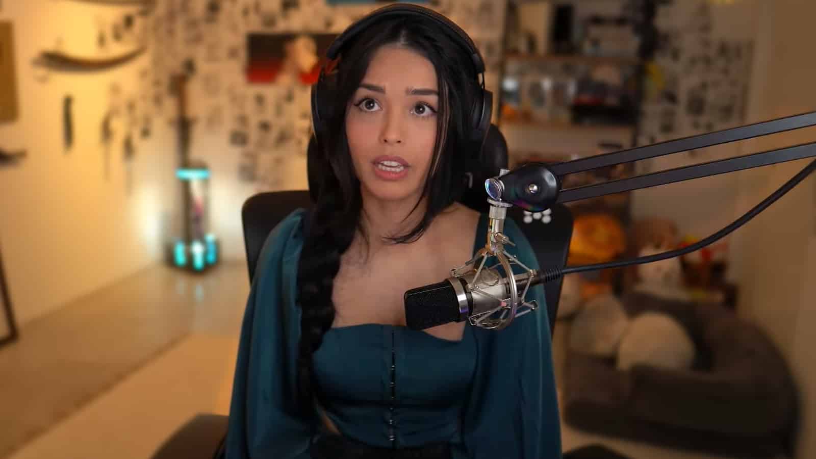 Valkyrae stares off in worry during YouTube stream.