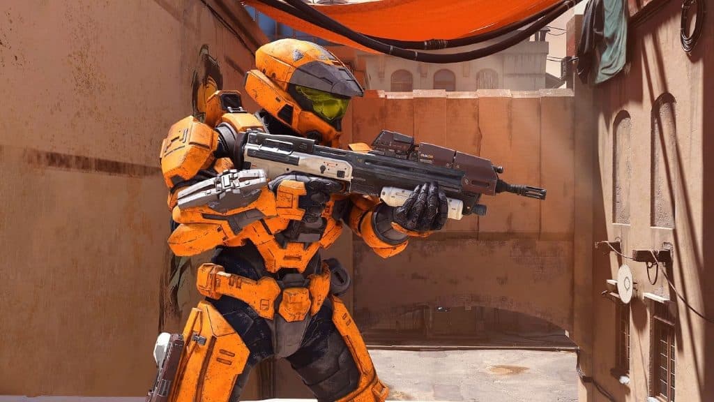 Halo Infinite multiplayer screenshot showing an orange Spartan