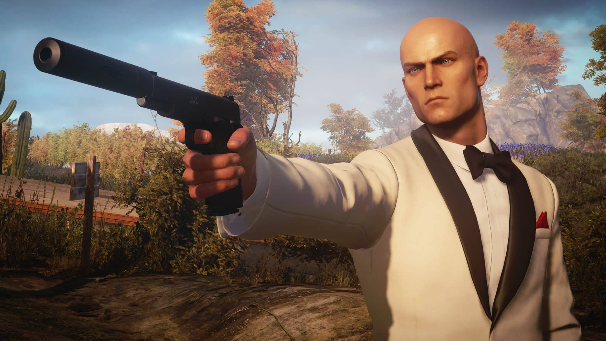 Hitman 3 screenshot showing Agent 47 with his weapon drawn