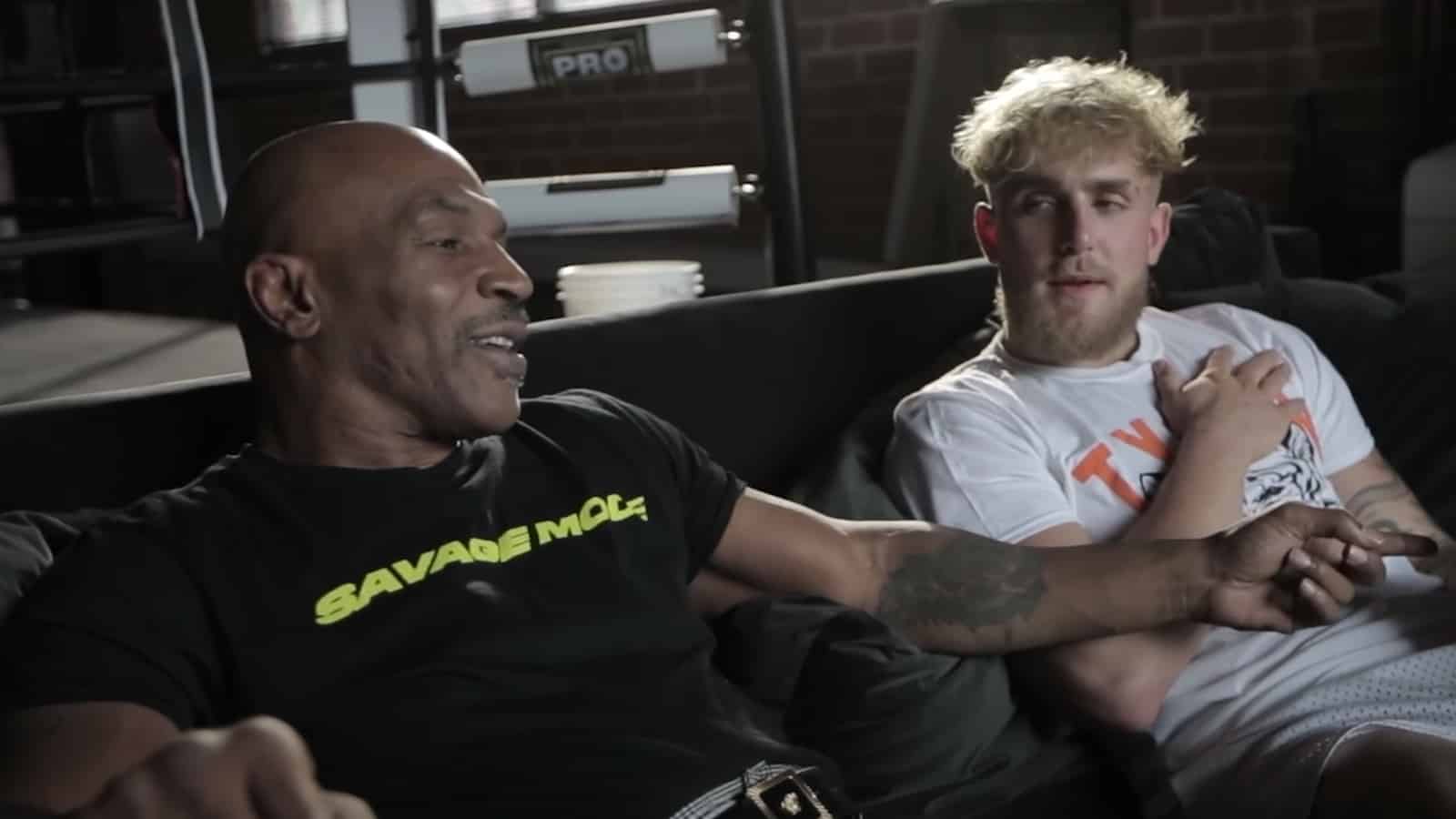 Mike Tyson chatting to Jake Paul