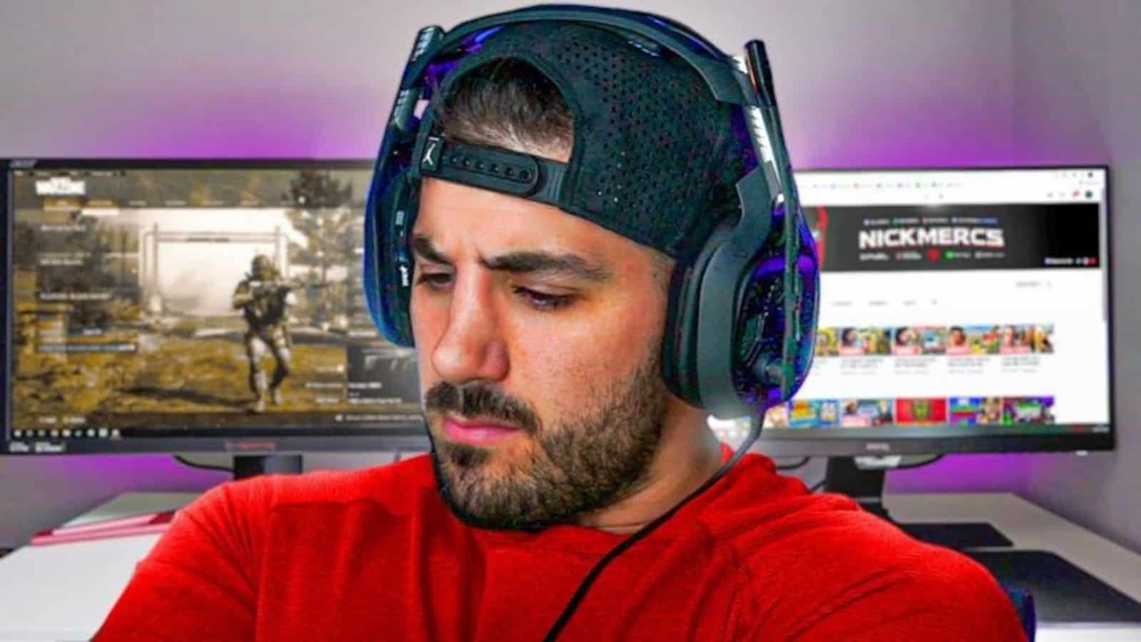 NICKMERCS looking grumpy with YouTube and Warzone screens in background