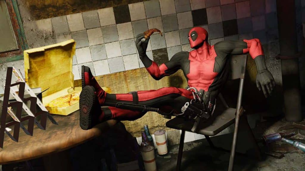 Deadpool sitting on chair holding pizza
