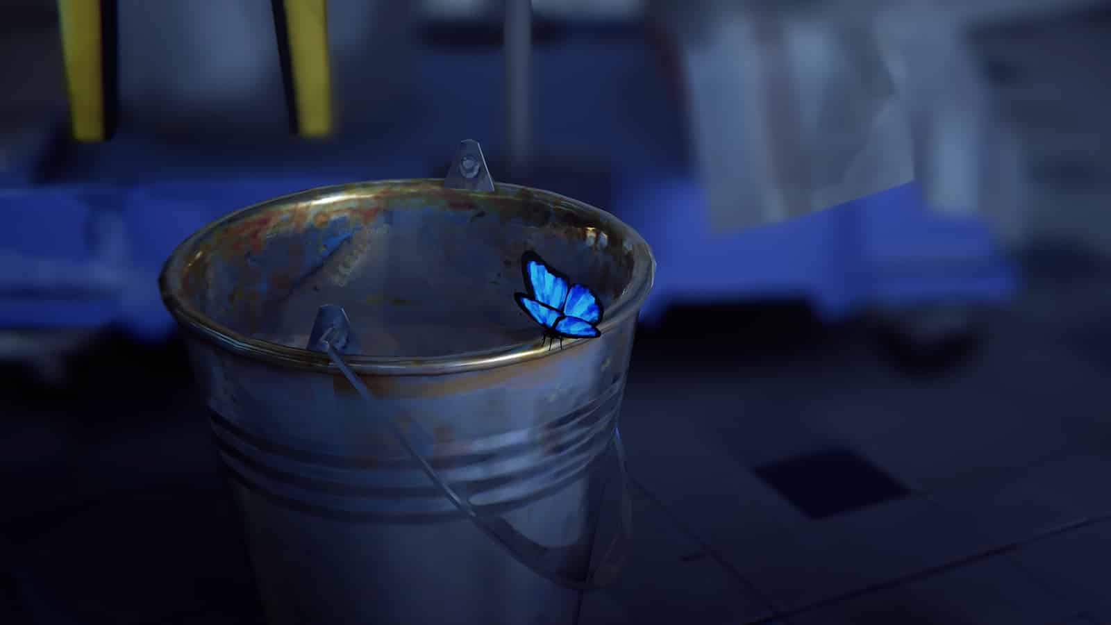 An image of the blue Butterfly resting on a bucket