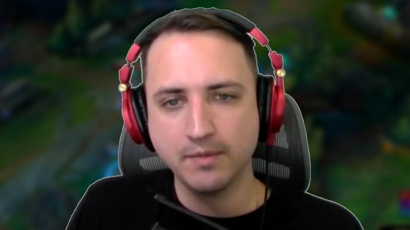 montecristo on stream with blurred league of legends rift in background