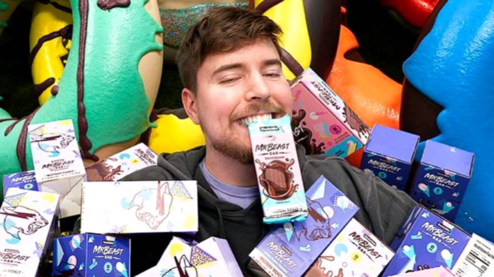MrBeast surrounded by chocolate bars