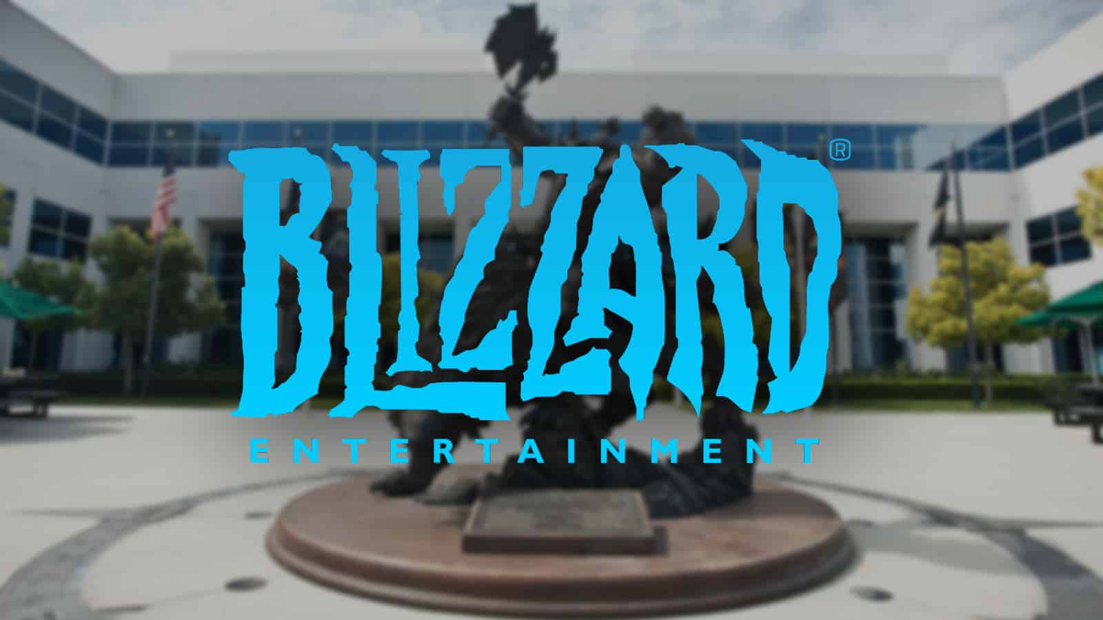 activision blizzard logo over wow world of warcraft orc statue