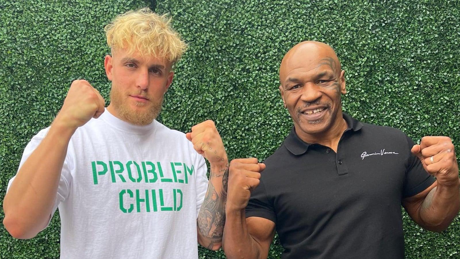 Jake Paul and Mike Tyson fighting