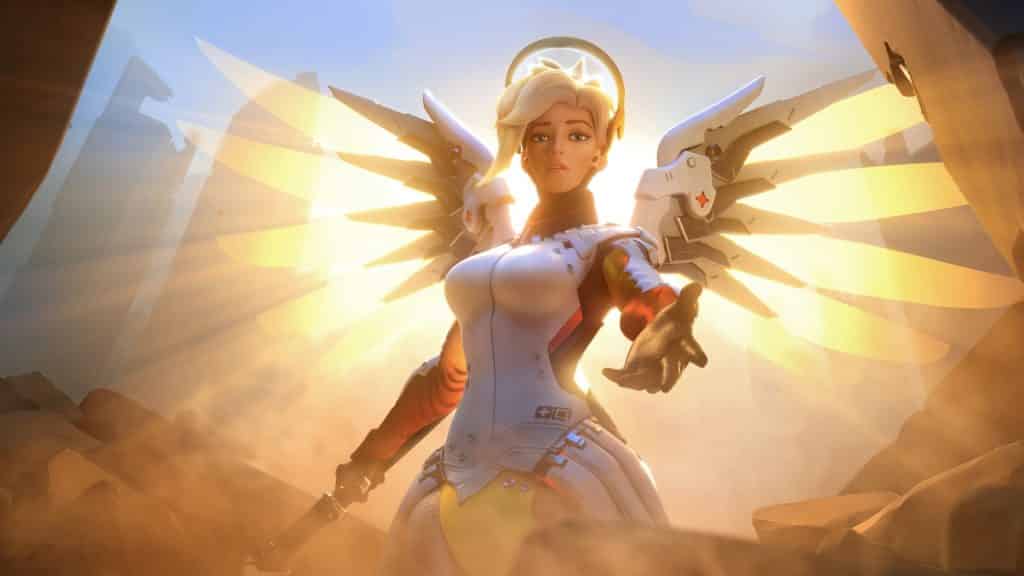 overwatch mercy holds hand out to the screen during resurrect
