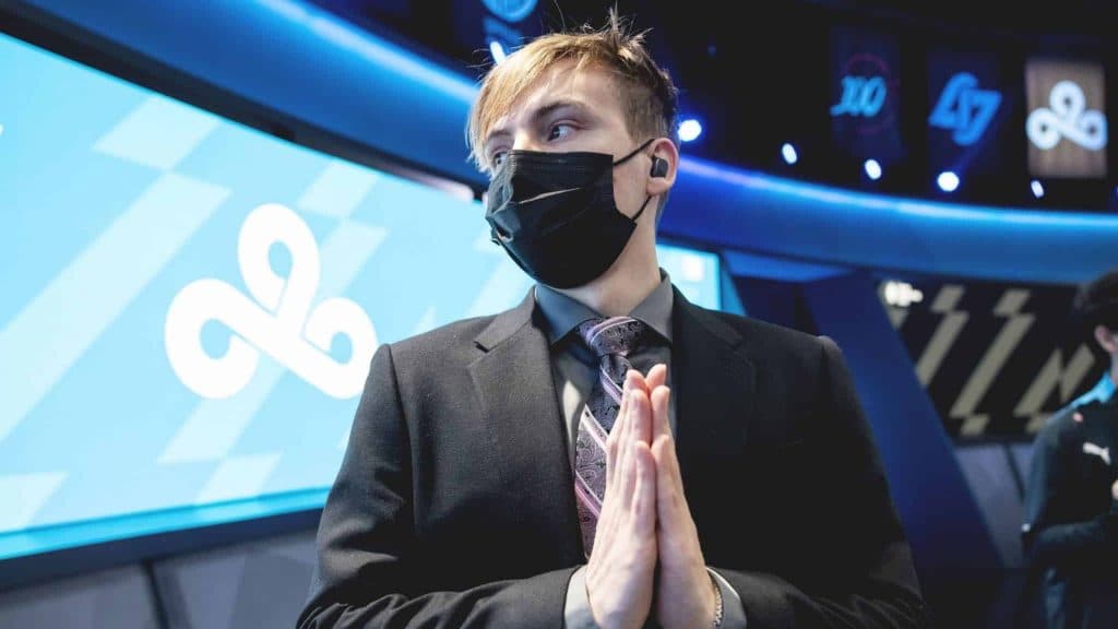 Cloud9 coach LS praying on stage at LCS Spring 2022