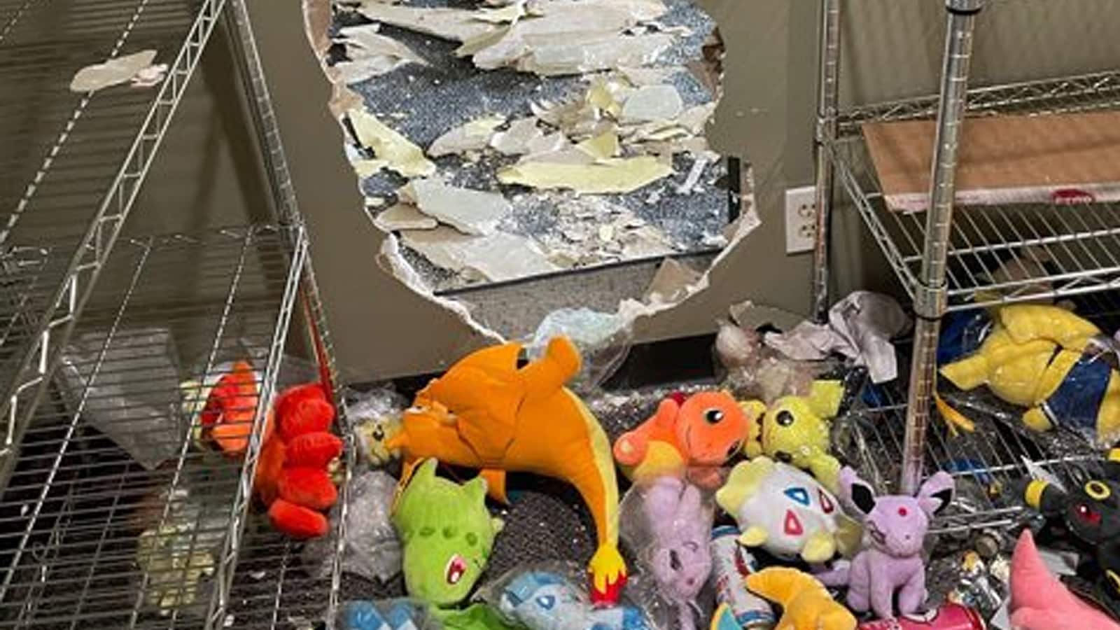 Twitter user mcguirereports image of thieves smashing through shop wall to steal Pokemon cards.
