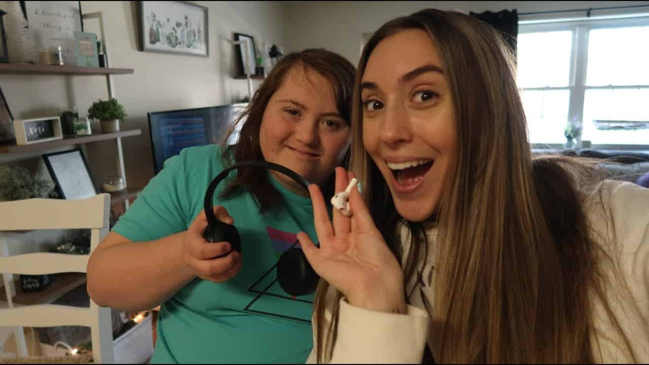 emily and sarah carolyn holding airpods and headphones