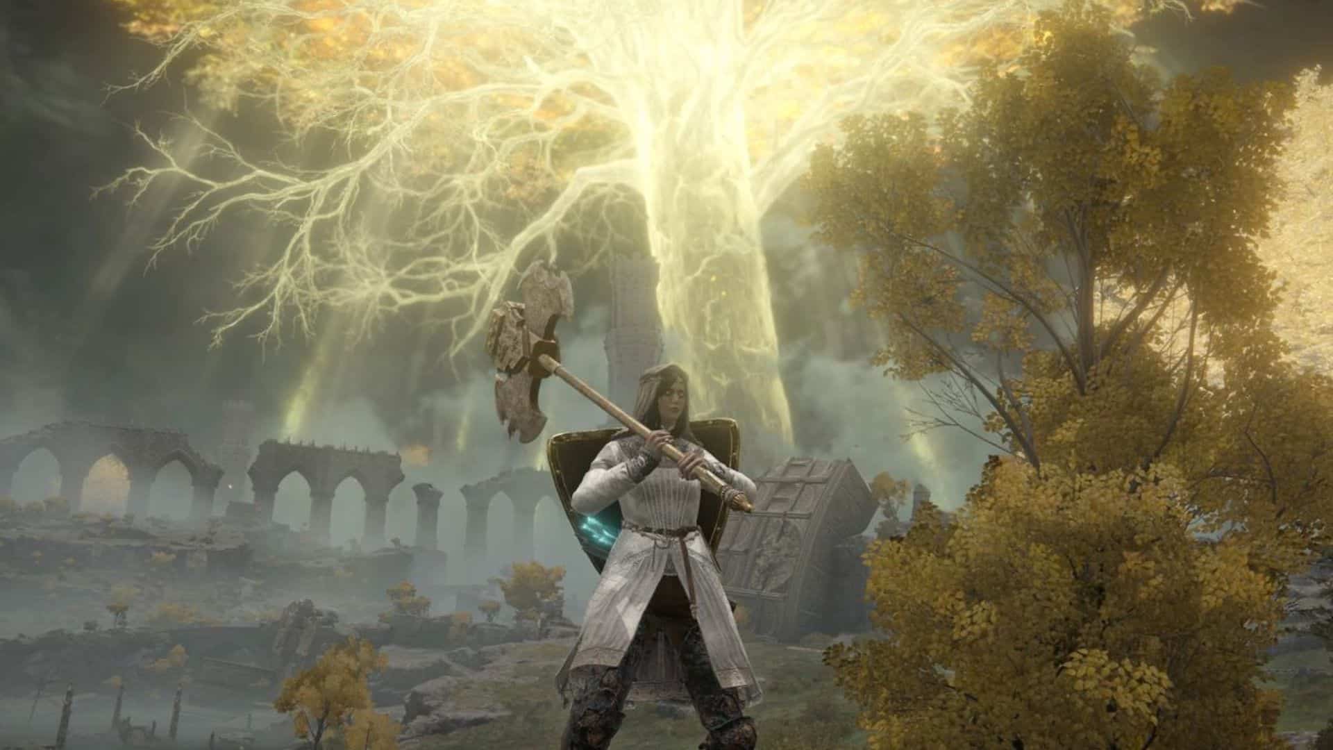 player standing in front of large glowing tree in elden ring
