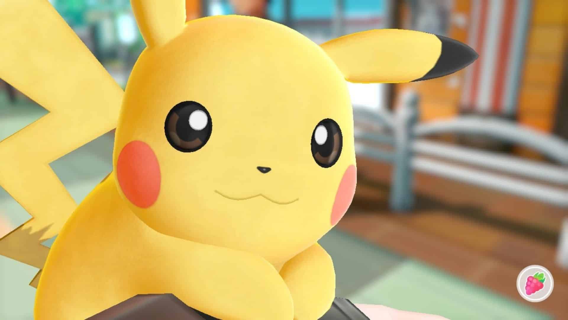pikachu smiling at trainer in pokemon let's go pikachu