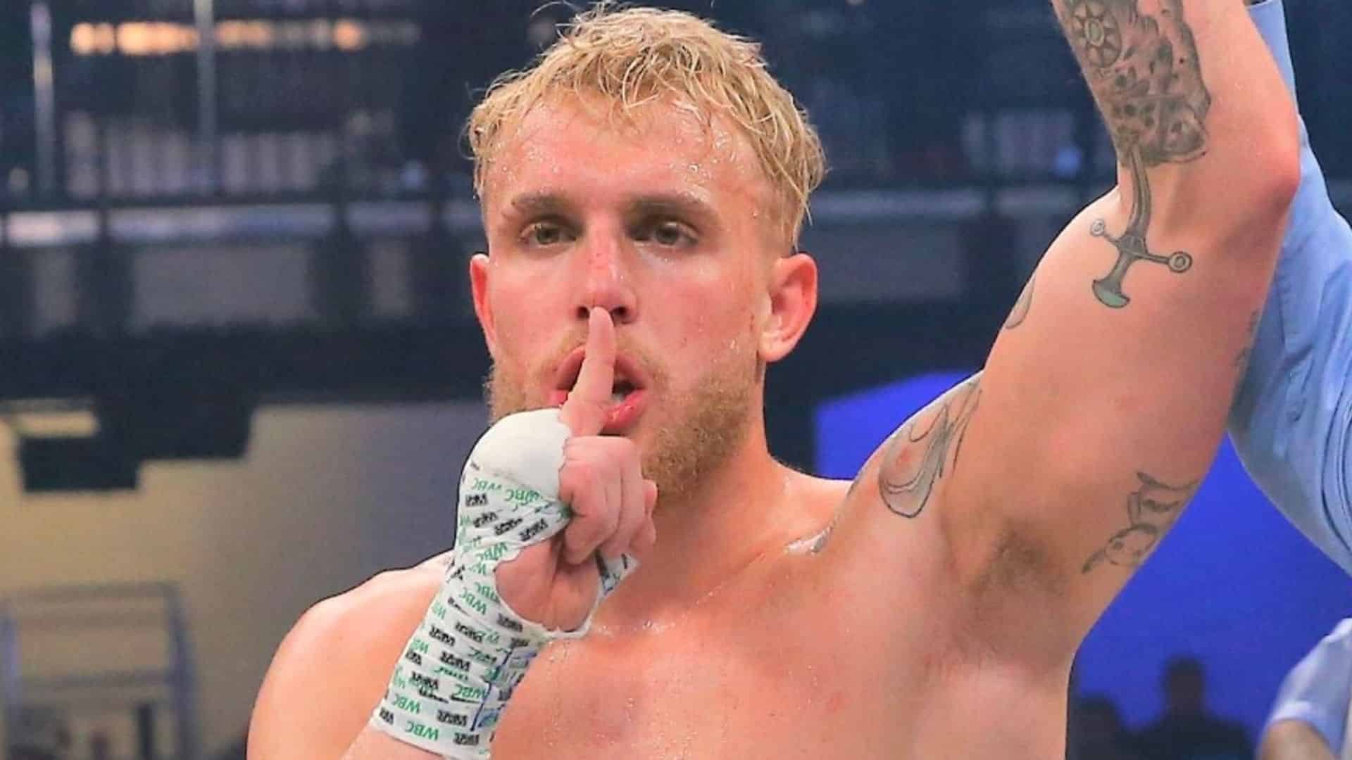 Jake Paul with hand raised in boxing ring