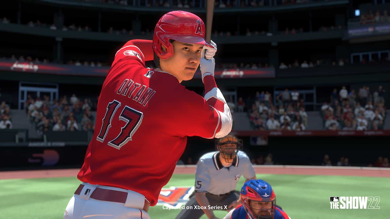 MLB The Show 22 screenshot showing a player preparing to swing a baseball bat