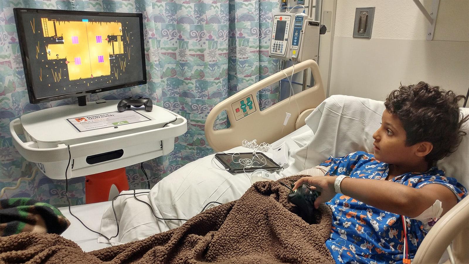 gamers outreach patient playing games on go kart