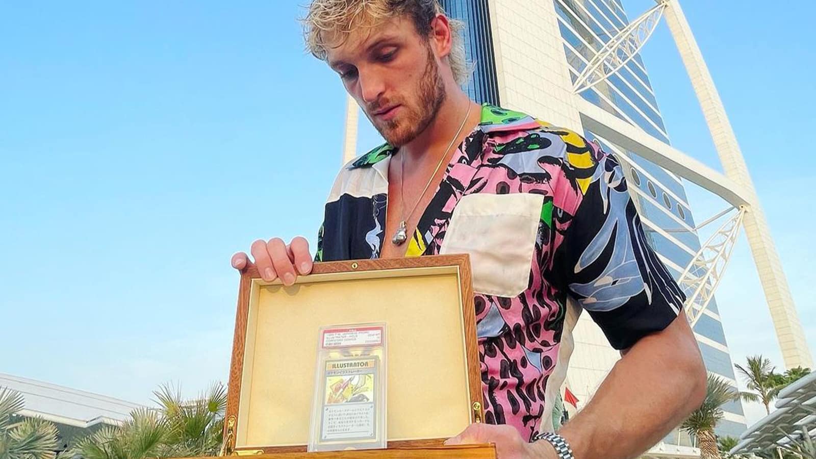 Logan Paul holding $5 million Pokemon Card in Dubai.