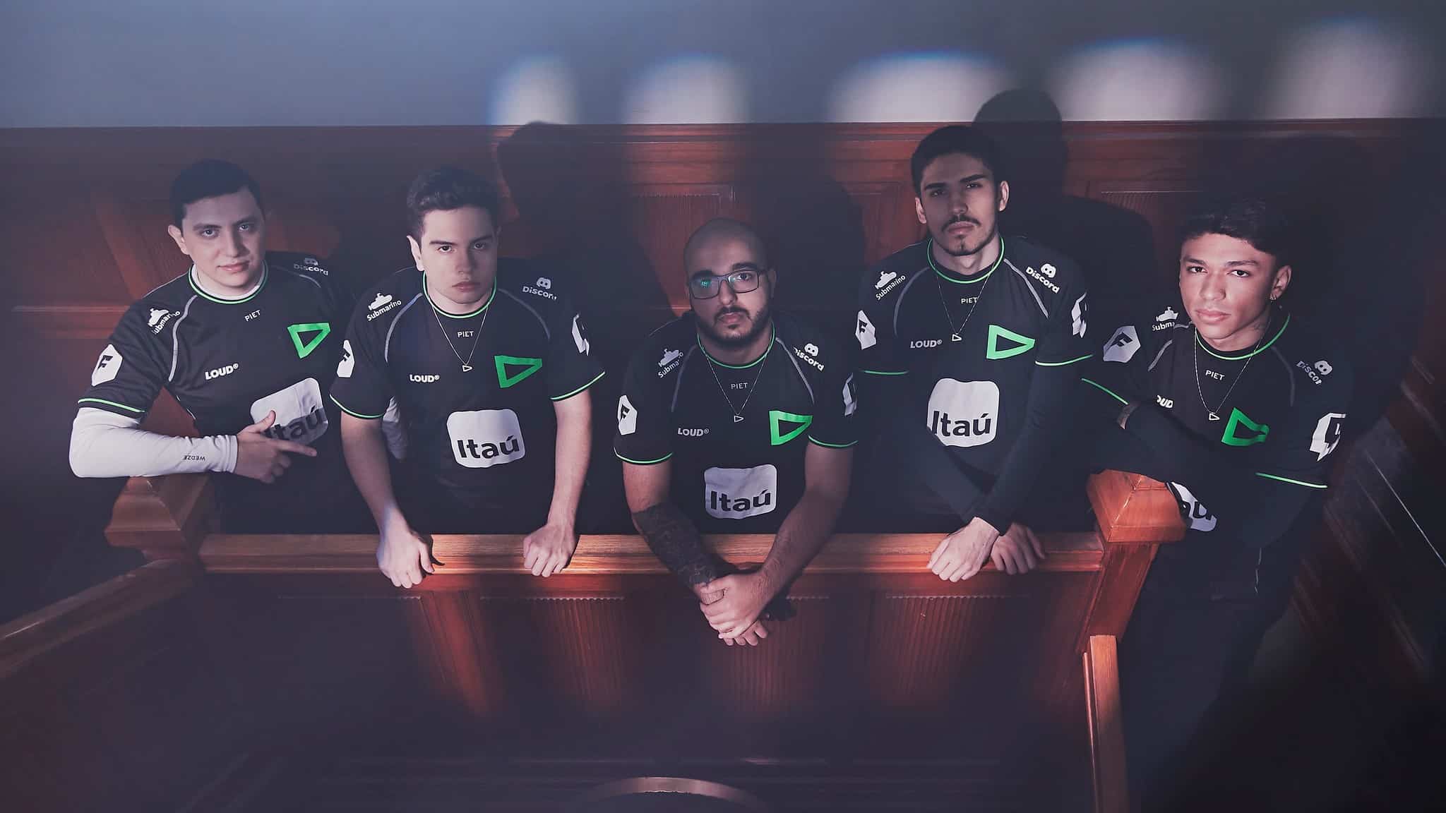The entire LOUD team looking up at the camera on a balcony