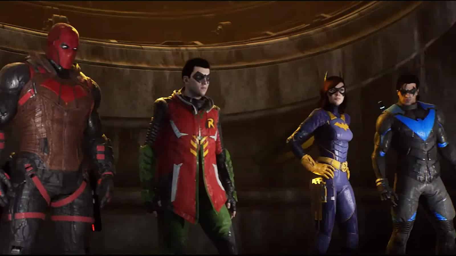 gotham knights robin nightwing batgirl and red hood standing above gotham city