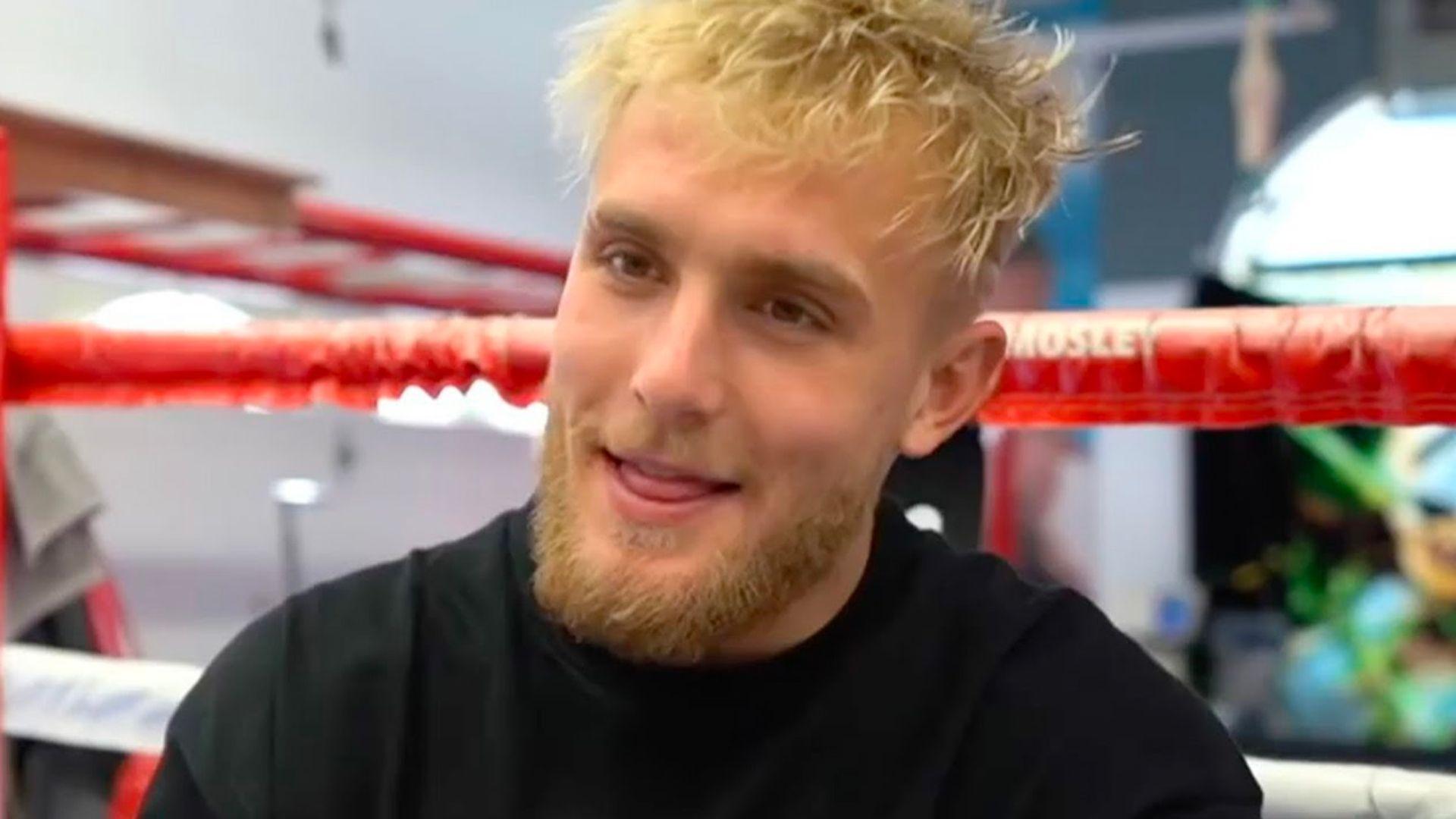 Jake Paul pulling tongues on ringside of boxing ring