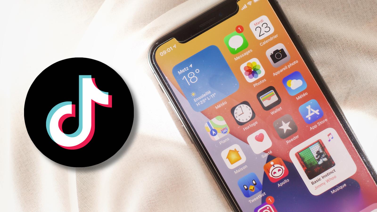 TikTok logo next to an iPhone