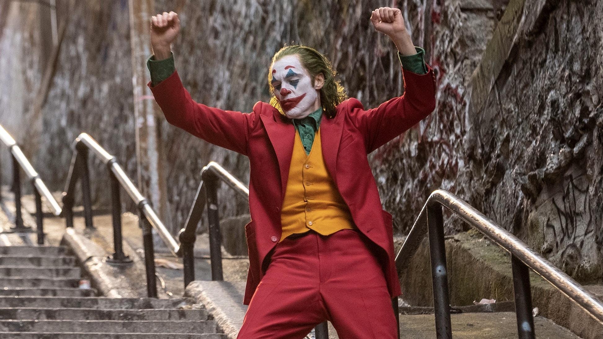 the joker dancing on the stairs