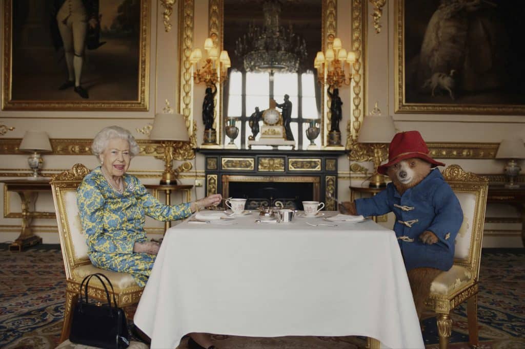 Paddington having tea with the queen