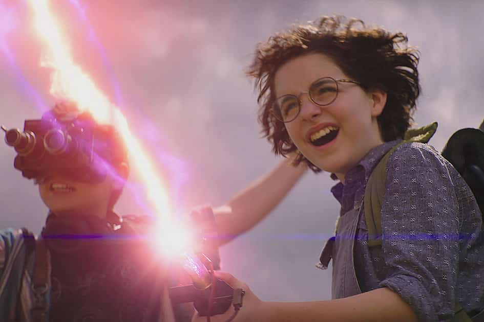 Mckenna Grace with a proton pack in Ghostbusters: Afterlife