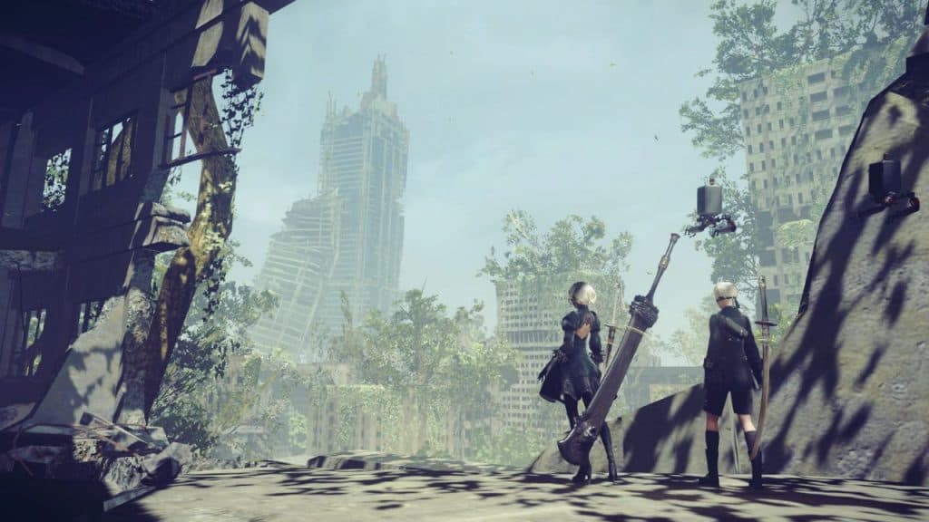 2B and 9S looking at a desolate city