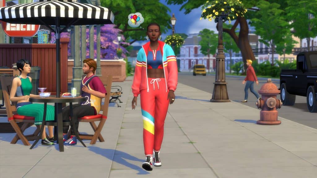 Sim walking down street in The Sims 4