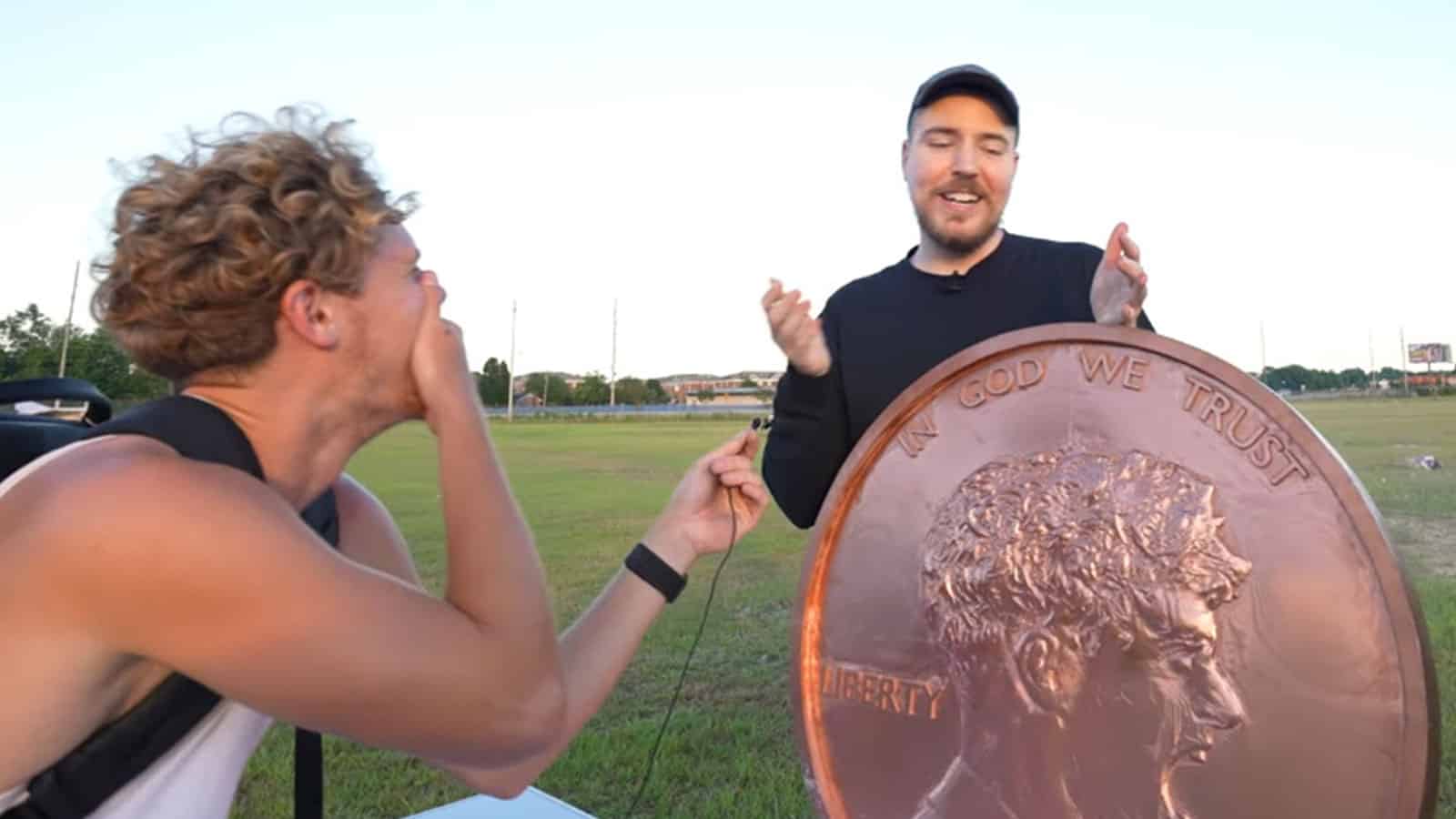 MrBeast holding giant penny