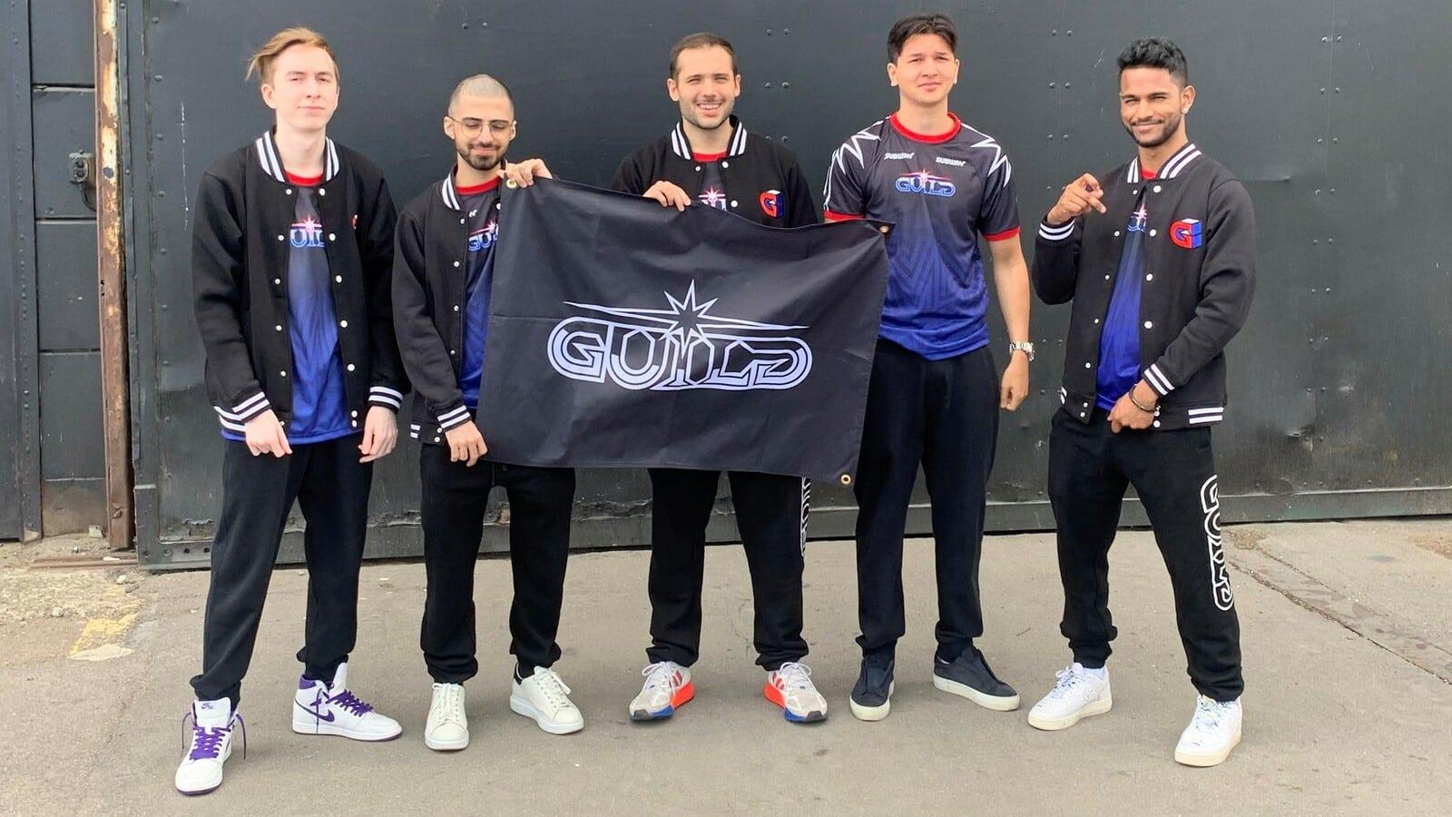 Guild Esports hold up a Guild flag at Masters Copenhagen