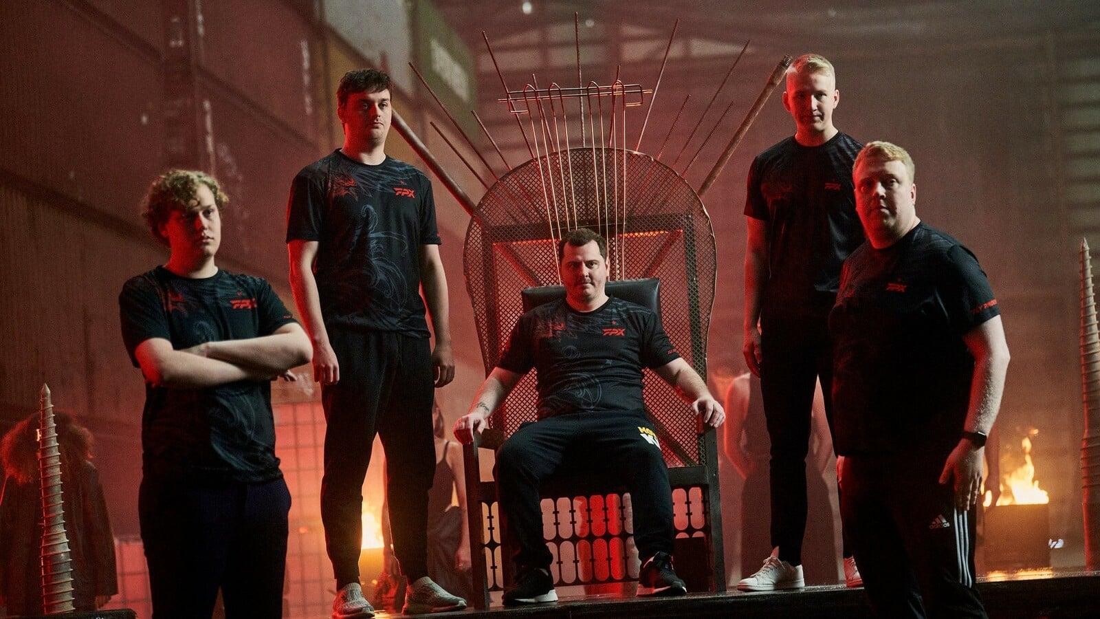 FPX team with ANGE1 sitting in a thrown surrounded by teammates at Masters Copenhagen
