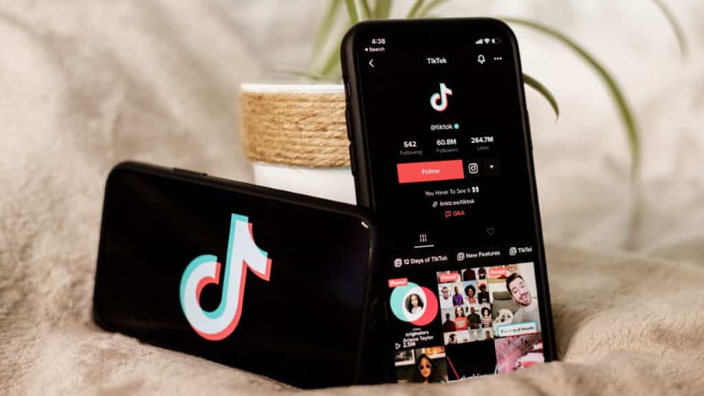 Two phones with TikTok logo showing