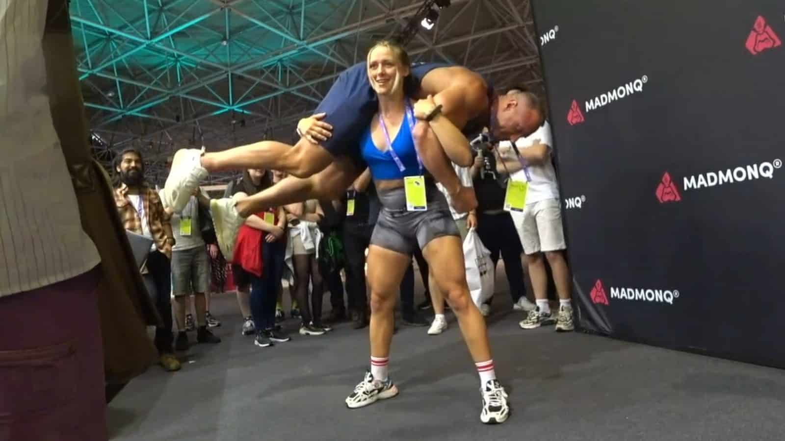 Twitch streamer Knut being lifted by fan at TwitchCon 2022