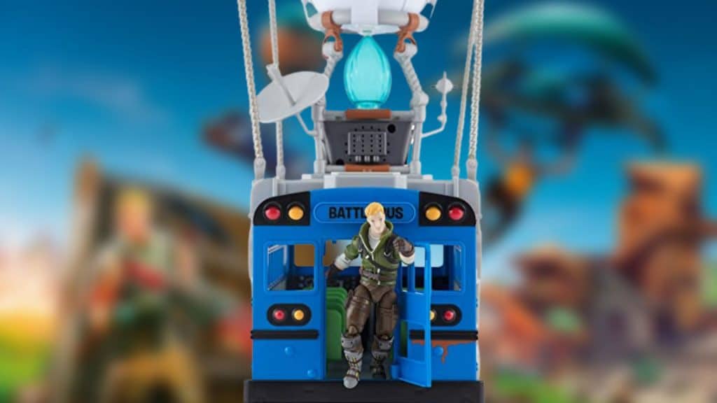 Battle bus toy in front of Fortnite background