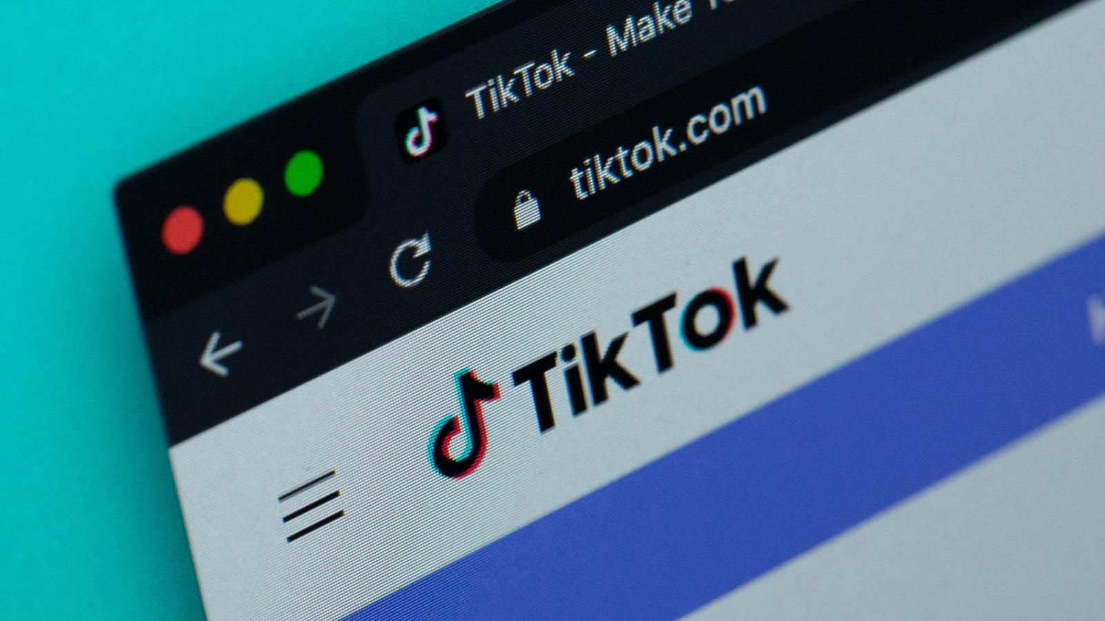 TikTok website on blue background