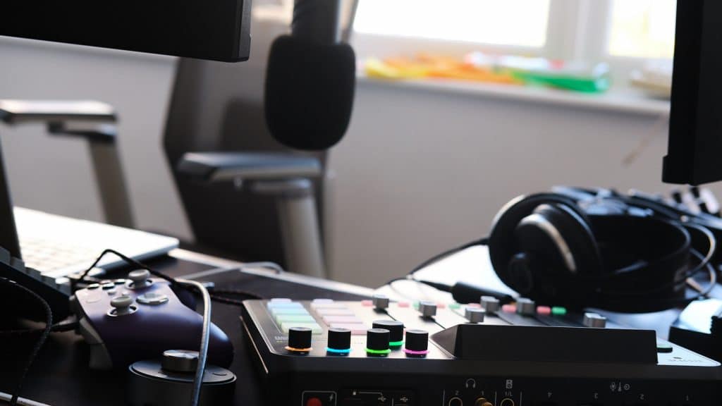RodeCaster Pro 2 on a desk with a microphone