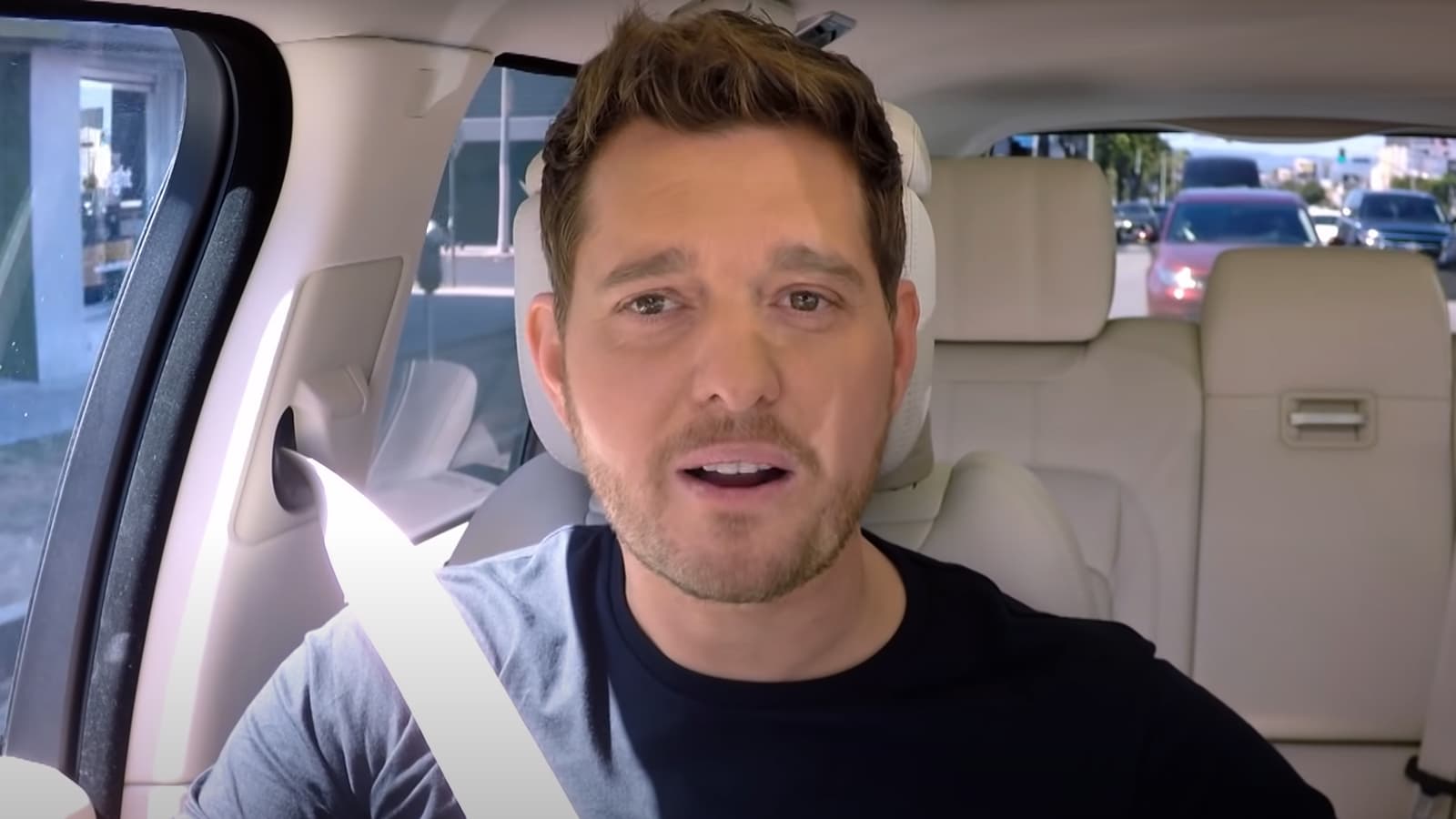 Michael Buble riding in a car