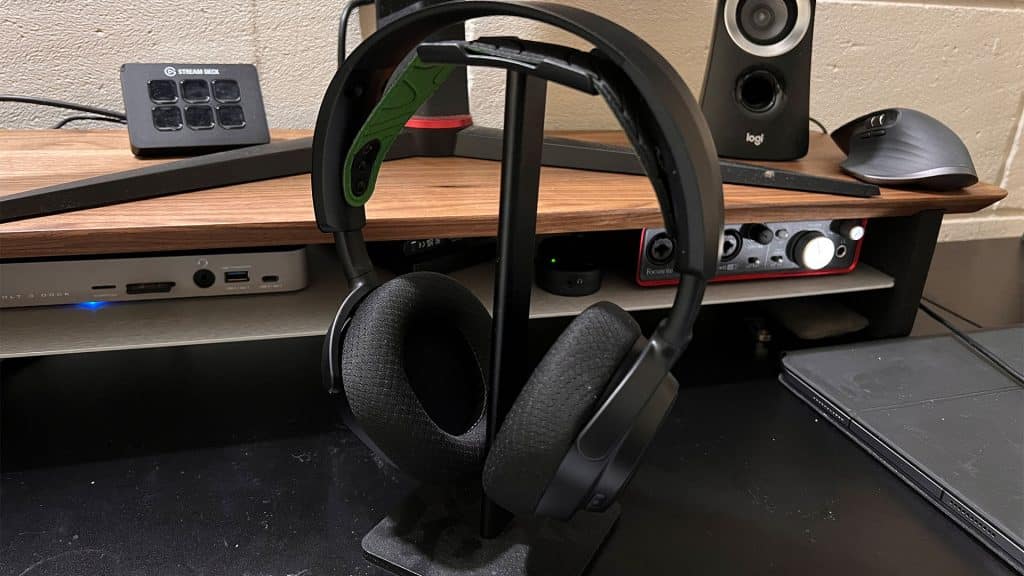 SteelSeries Arctis Nova 7X wireless headset on a headphone stand