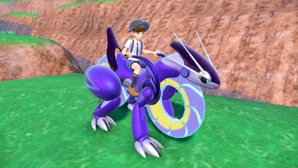 A trainer riding Miraidon in Pokemon Scarlet and Violet