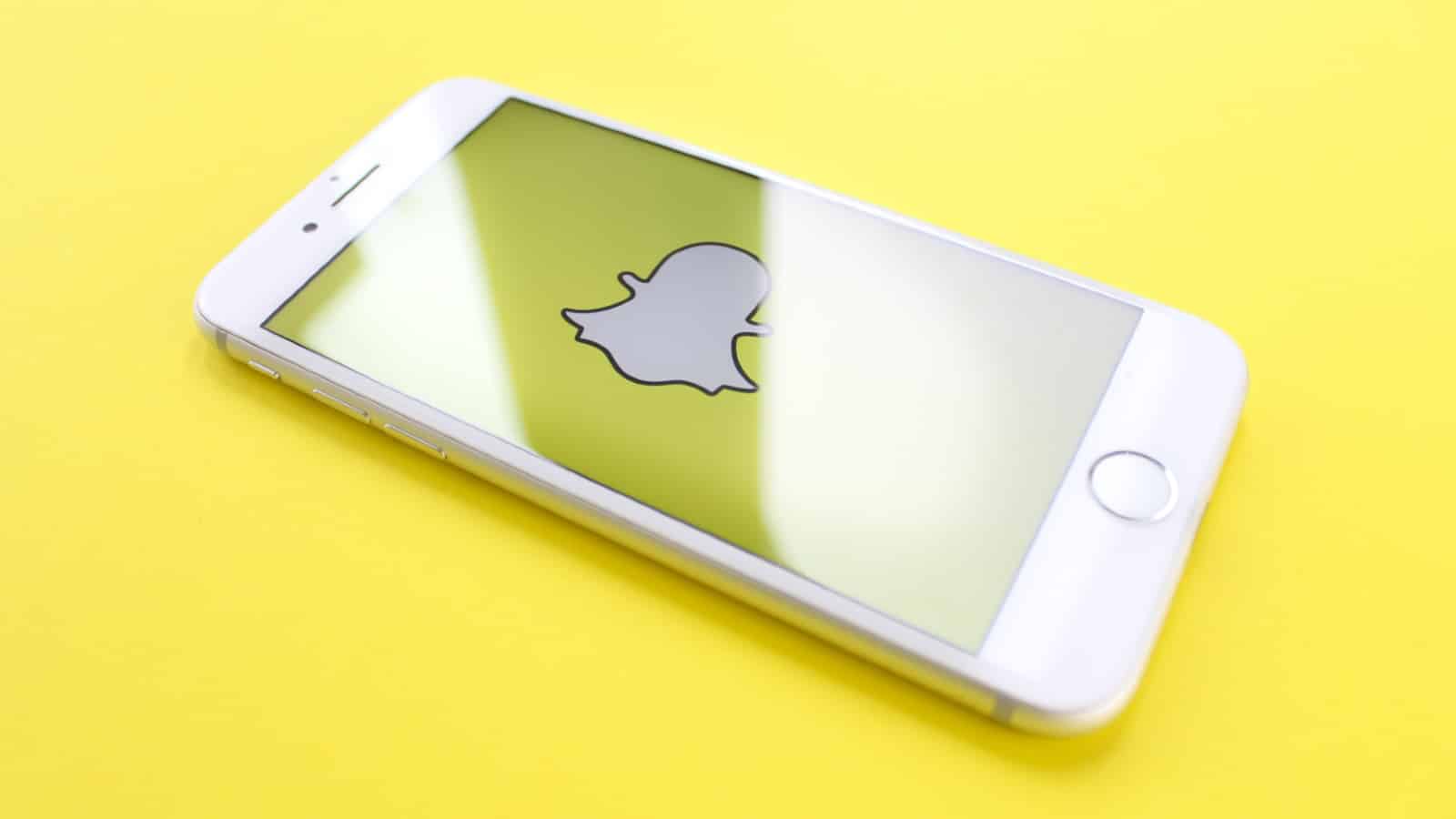 Snapchat logo on a phone