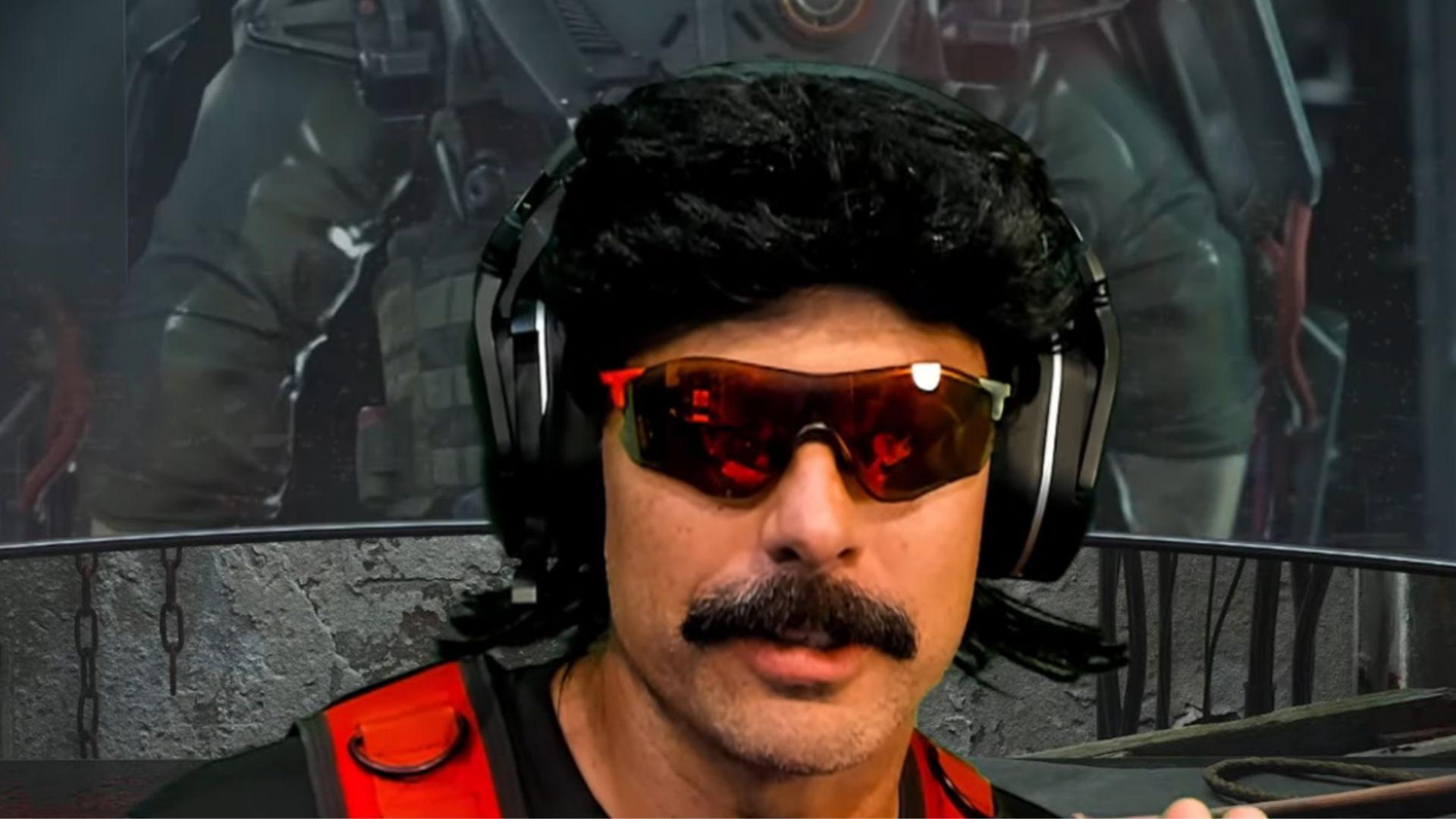 Dr Disrespect sat talking to camera in front of Advanced Warfare character