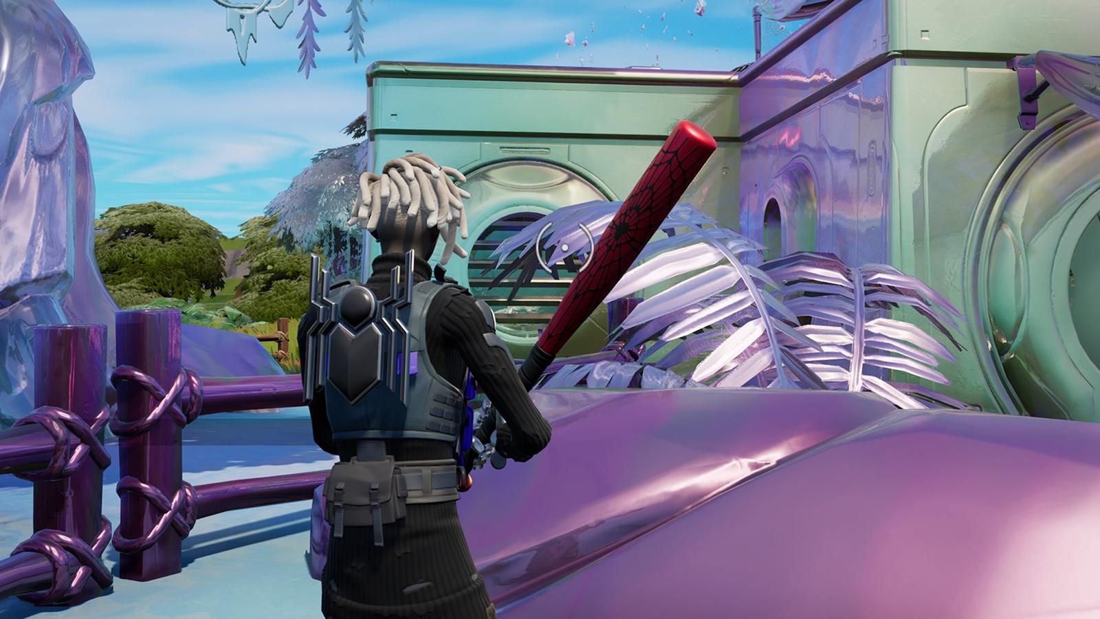 A Fortnite player destroying chrome structures