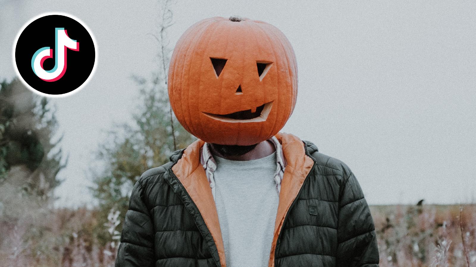 Person with pumpkin on their head