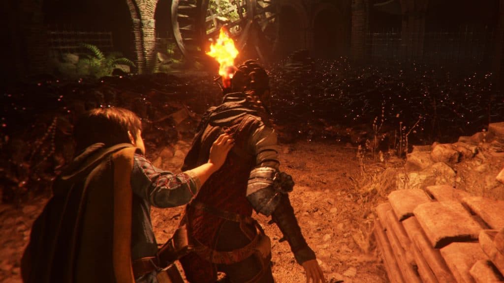 A plague tale going through rats with a torch