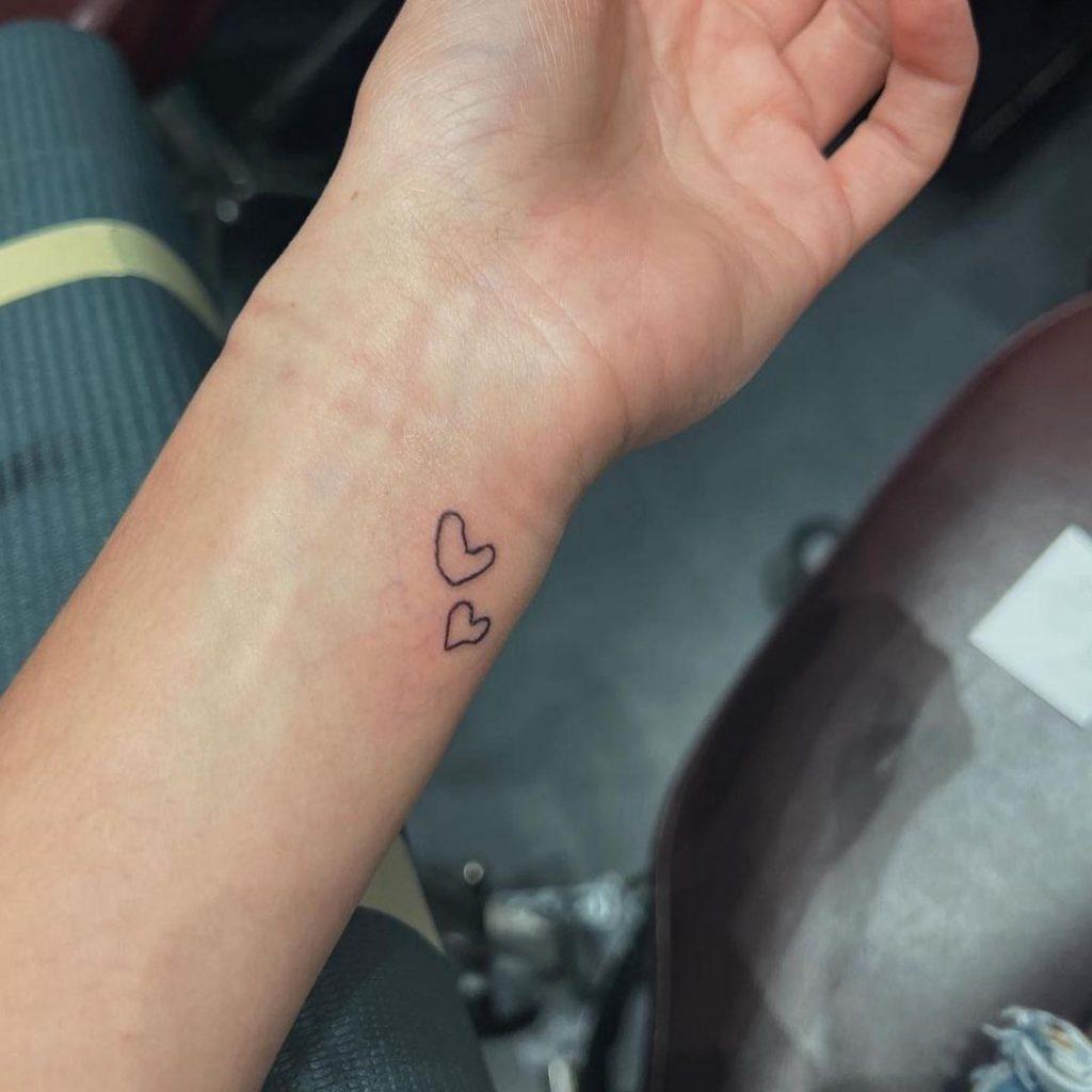 Charli new heart tattoos