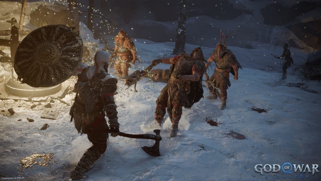 God of War Ragnarok screenshot showing combat against Raiders