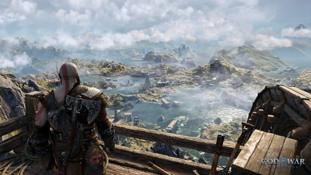 Kratos looking out over a picturesque landscape
