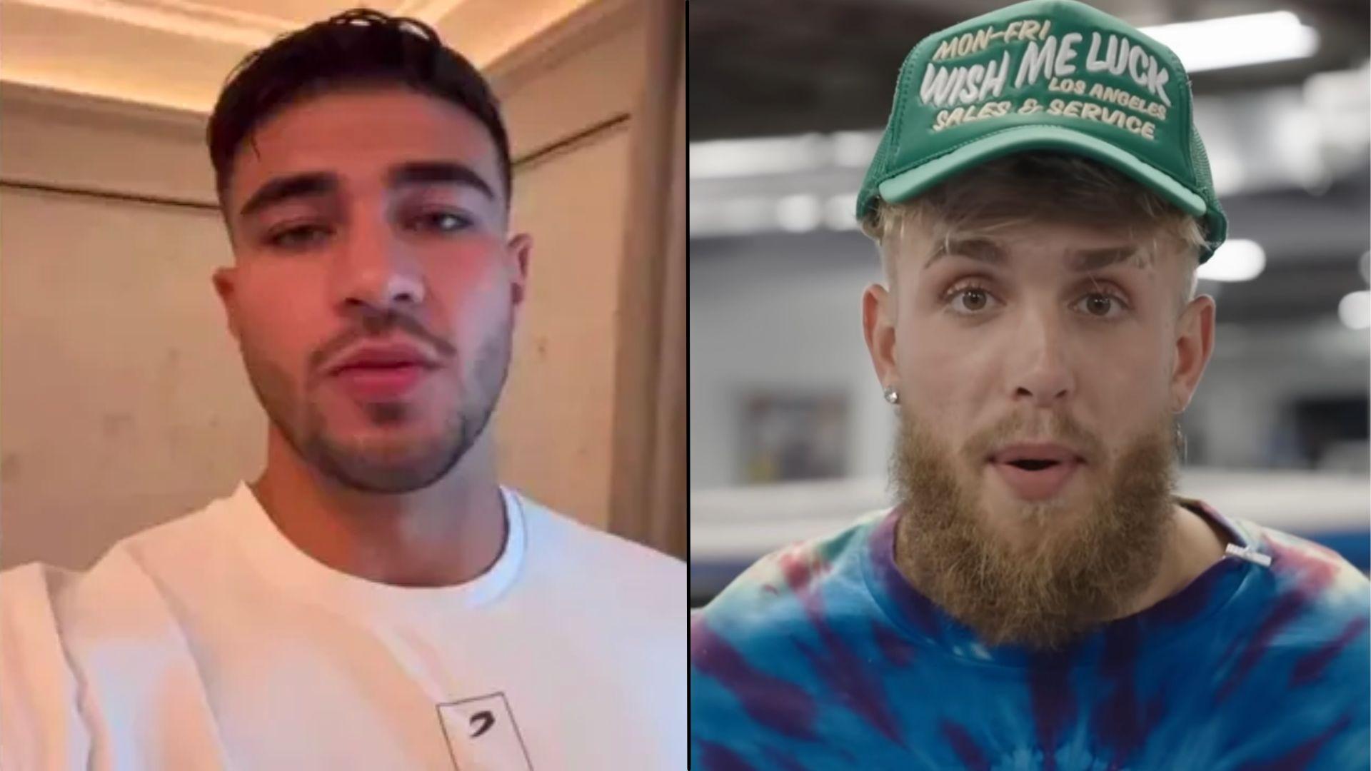 Tommy Fury in white shirt next to Jake paul in blue shirt and green hat talking to camera